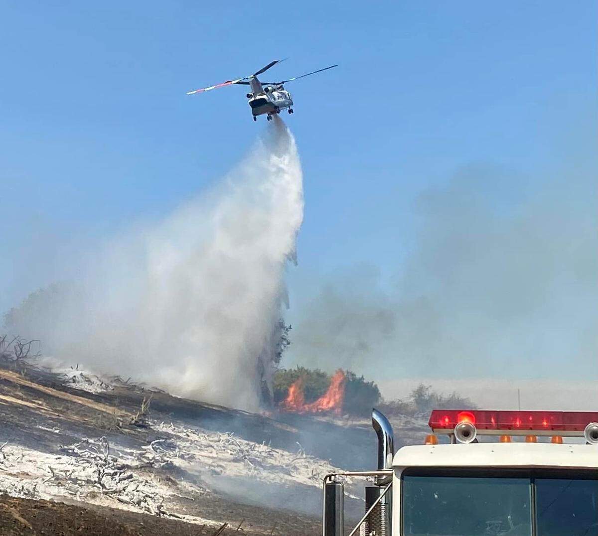 Cal Fire reported containing a wildfire Monday, July 11, 2022 near Highway 132 in the Roberts Ferry area east of Modesto, Calif.