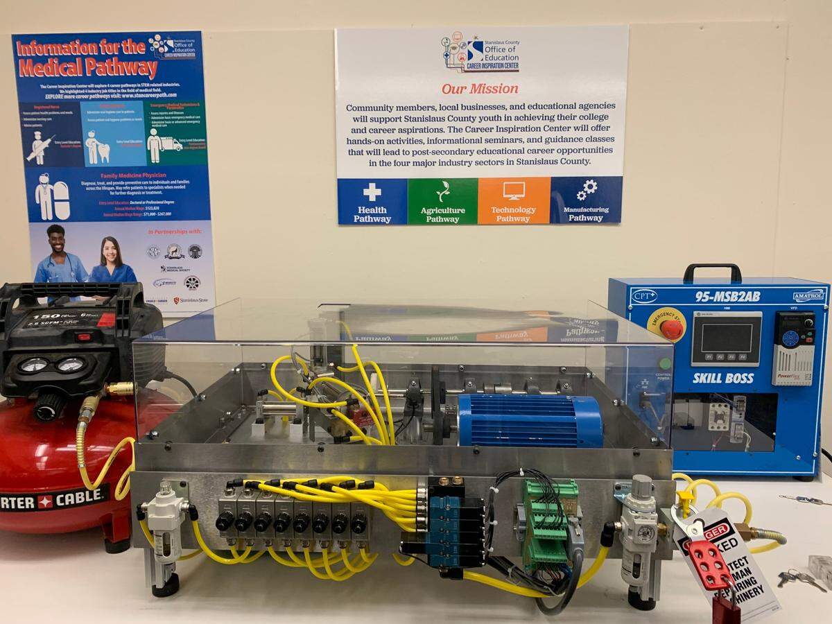 Students can use a “skill boss” machine, a training system that simulates how manufacturing works in a condensed space, at the Career Inspiration Center.