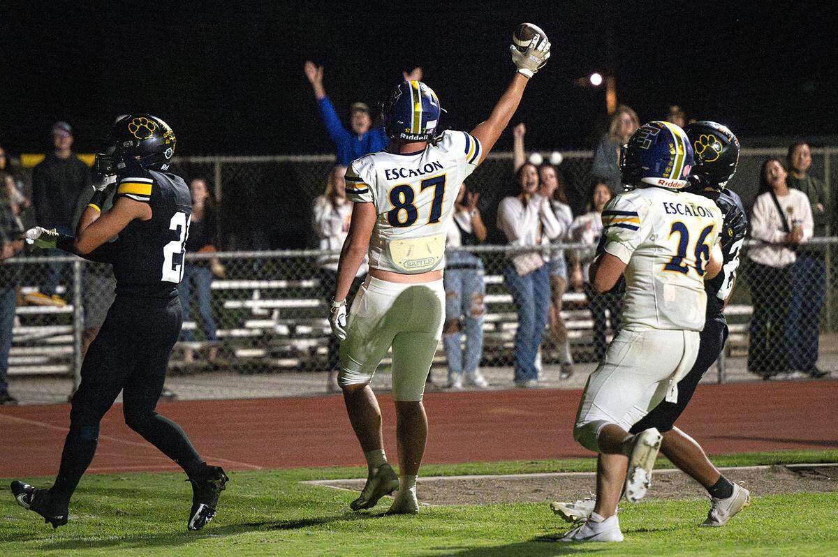 Escalon’s Ryan Lewis celebrates a touchdown during the Trans Valley League game with Hughson at Hughson High School in Hughson, Calif., Friday, Sept. 29, 2023.