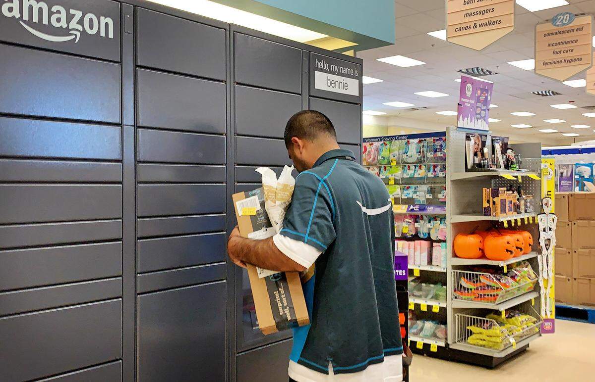 Amazon has installed new Hub Lockers in various locations in Modesto and the Central Valley. An Amazon delivery person brings packages to a locker inside of a Rite Aid on McHenry Avenue on Sept. 12, 2019.