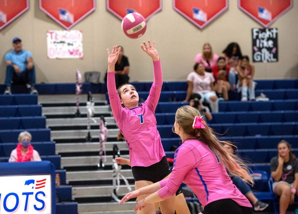Beyer’s Ella Gaylor (7) sets the ball for Haiden Dahl during the Western Athletic Conference match with Lathrop at Beyer High School in Modesto, Calif., Tuesday, Oct. 4, 2022. Beyer won 3-0.