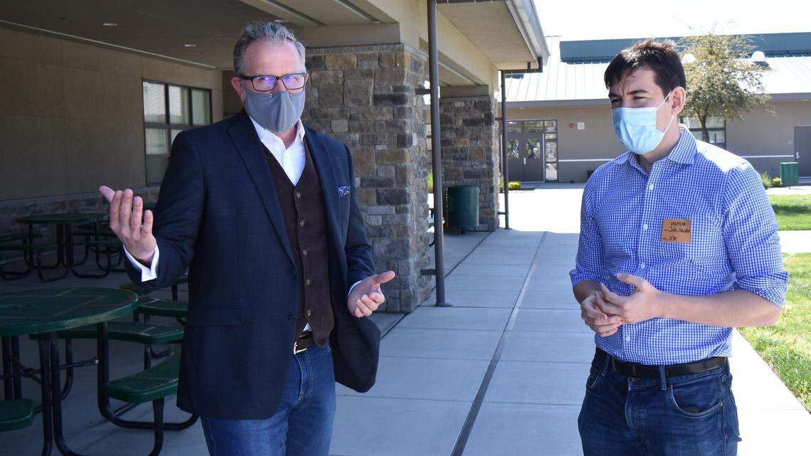 Stanislaus County Superintendent of Schools Scott Kuykendall shows U.S. Rep. Josh Harder around John B. Allard School/Tactical Character Academy in Ceres on March 30, 2021.