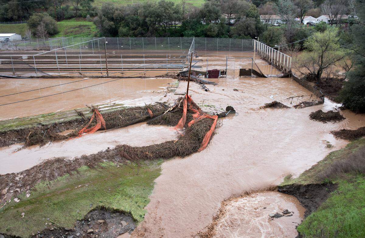 Water from the emergency spillway at Moccasin Reservoir flooded the Mocassin Fish Hatchery on Thursday March 22, 2018.