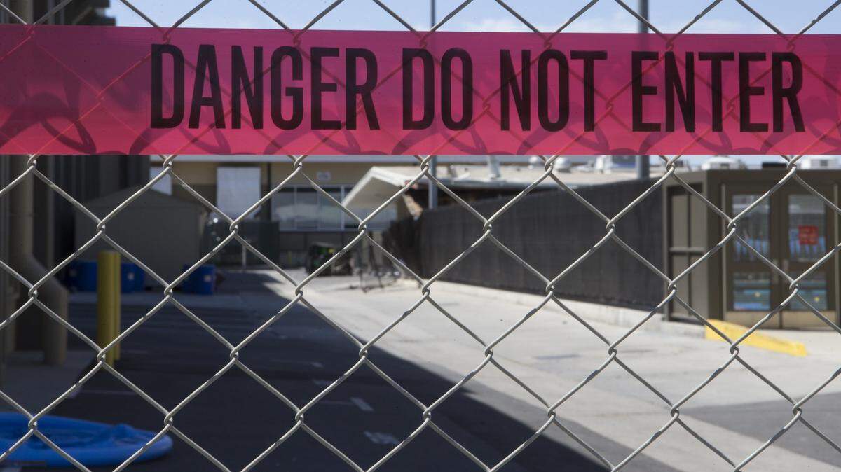 The area around a explosion Sunday morning at Modesto Jr Colleges east campus near the pool is fenced off and posted with a Danger Do Not Enter tape Monday June 17, 2018. 
