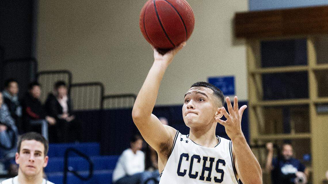 Central Catholic’s Dayton Magana attempts a jump shot during the Valley Oak League game with Weston Ranch at Central Catholic High School in Modesto, Calif., on Friday, Jan. 10, 2020.