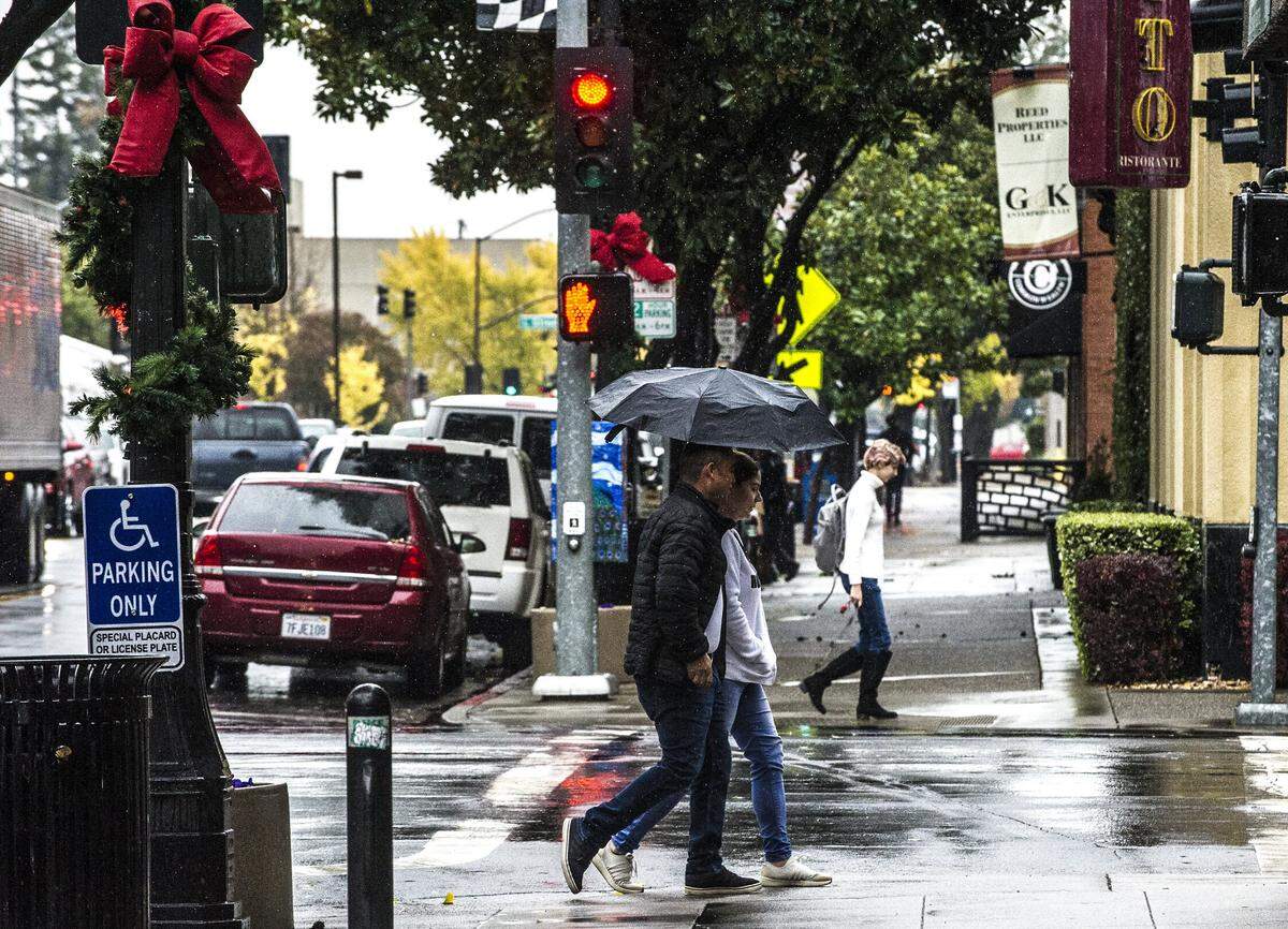 Umbrellas were out as the holiday season continued with more rain on Monday, Dec. 2, 2019, in Modesto, California.
