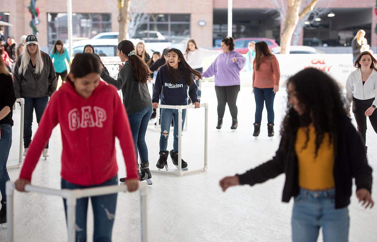 People skate at Modesto on Ice in Modesto, Calif., on Thursday, Jan. 2, 2020.