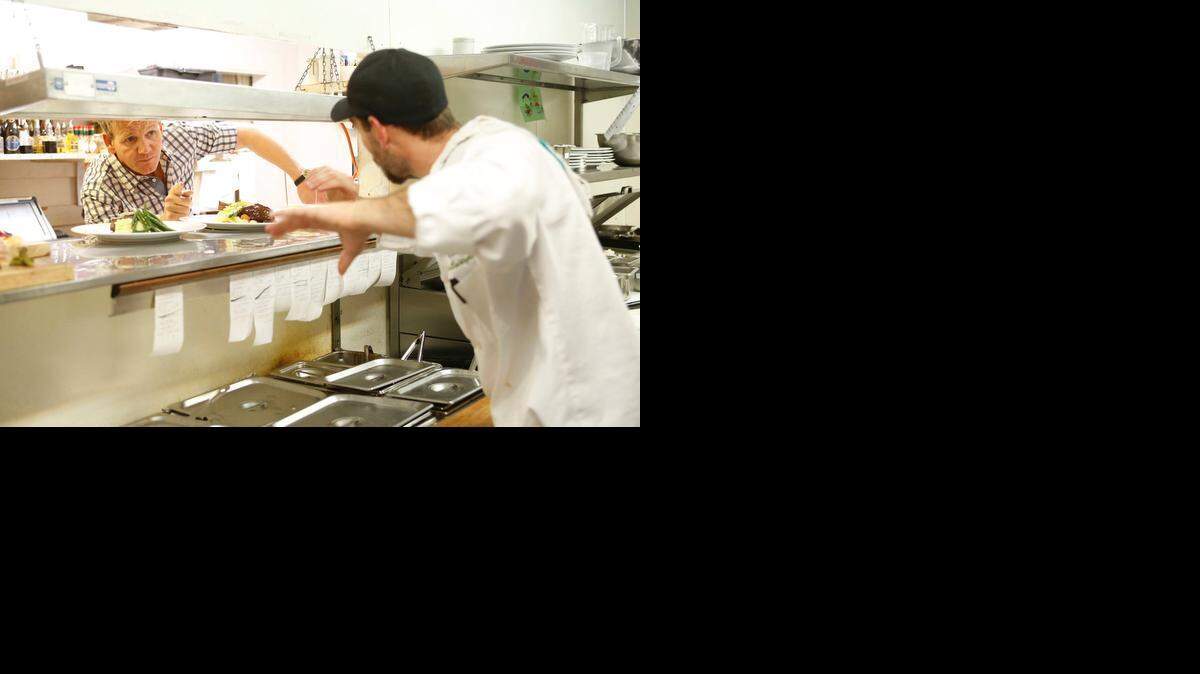 Gordon Ramsay, left, directs in the kitchen at Murphys Historic Hotel in the season finale of “Hotel Hell.”