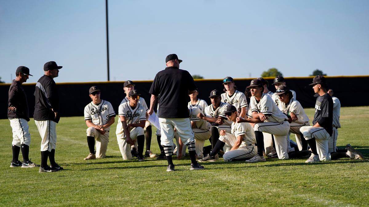 Enochs coaches talk with the team after a 3-2 comeback Central California Athletic League win over Gregori at Enochs High school on Monday, April 28, 2025.