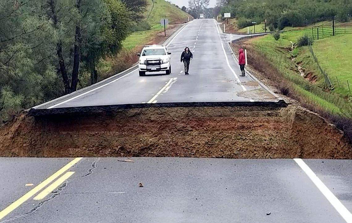 Highway 132 is closed because of a washout just before Granite Springs Road near Coulterville, Calif. on Thursday March 22, 2018.
