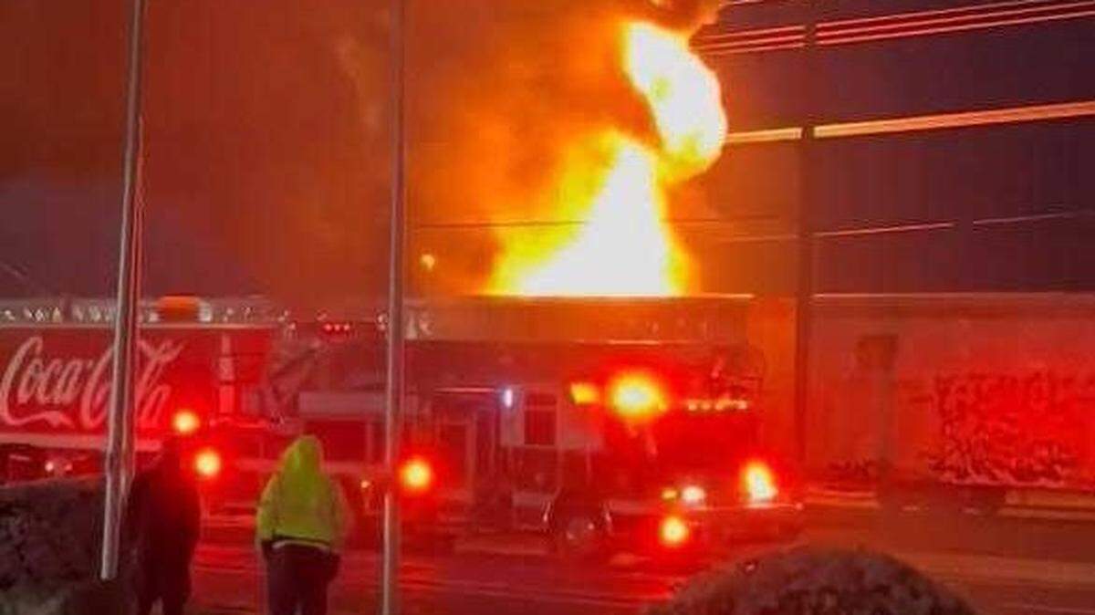 Firefighters respond to a freight train fire near Highway 132 in Modesto on Tuesday, April 9, 2024.
