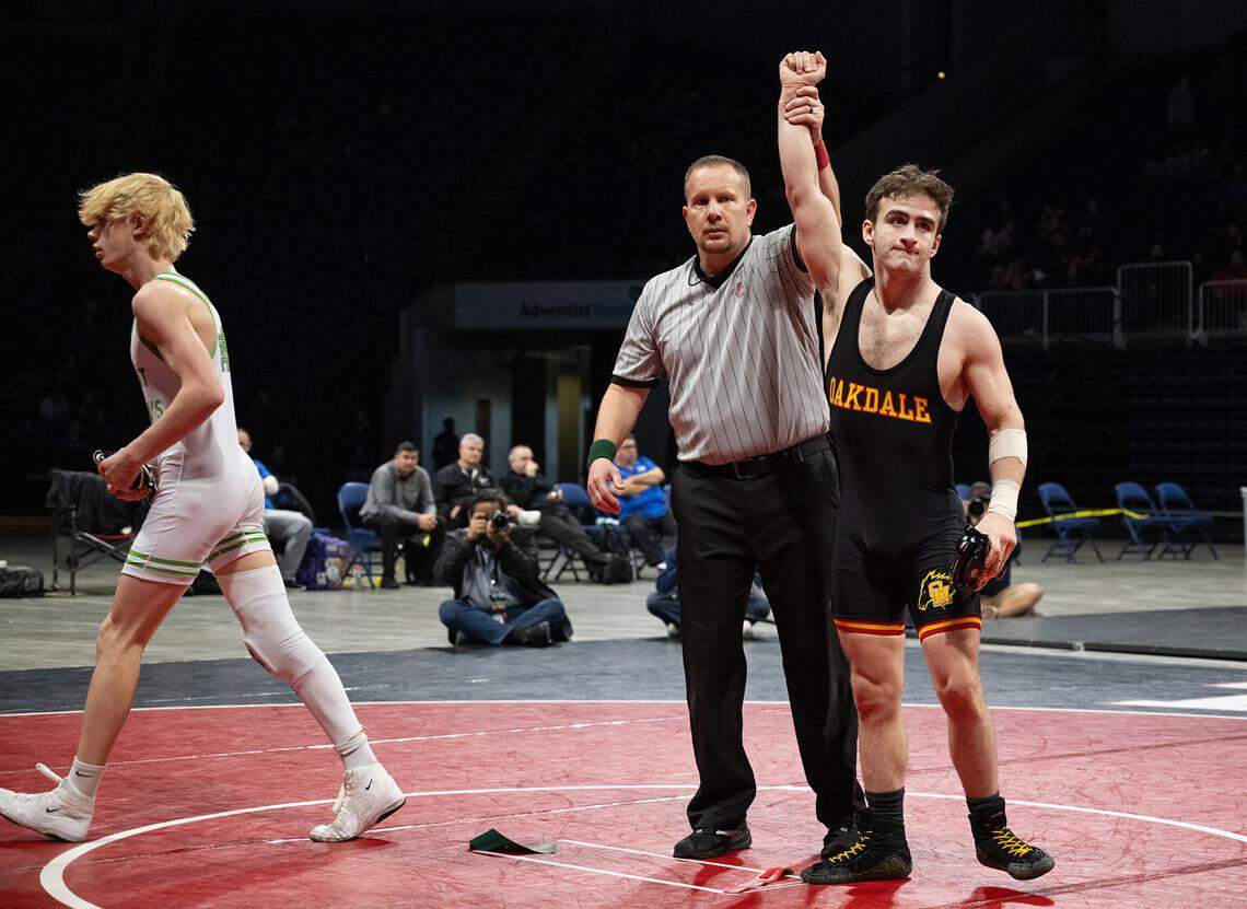 Oakdale’s Eziequel Vela pinned Kyle Holtberg of St. Mary’s at 1:29 for the126-pound title in the Sac-Joaquin Section Masters Wrestling Championships at Stockton Arena in Stockton, Calif., Saturday, Feb. 17, 2024.