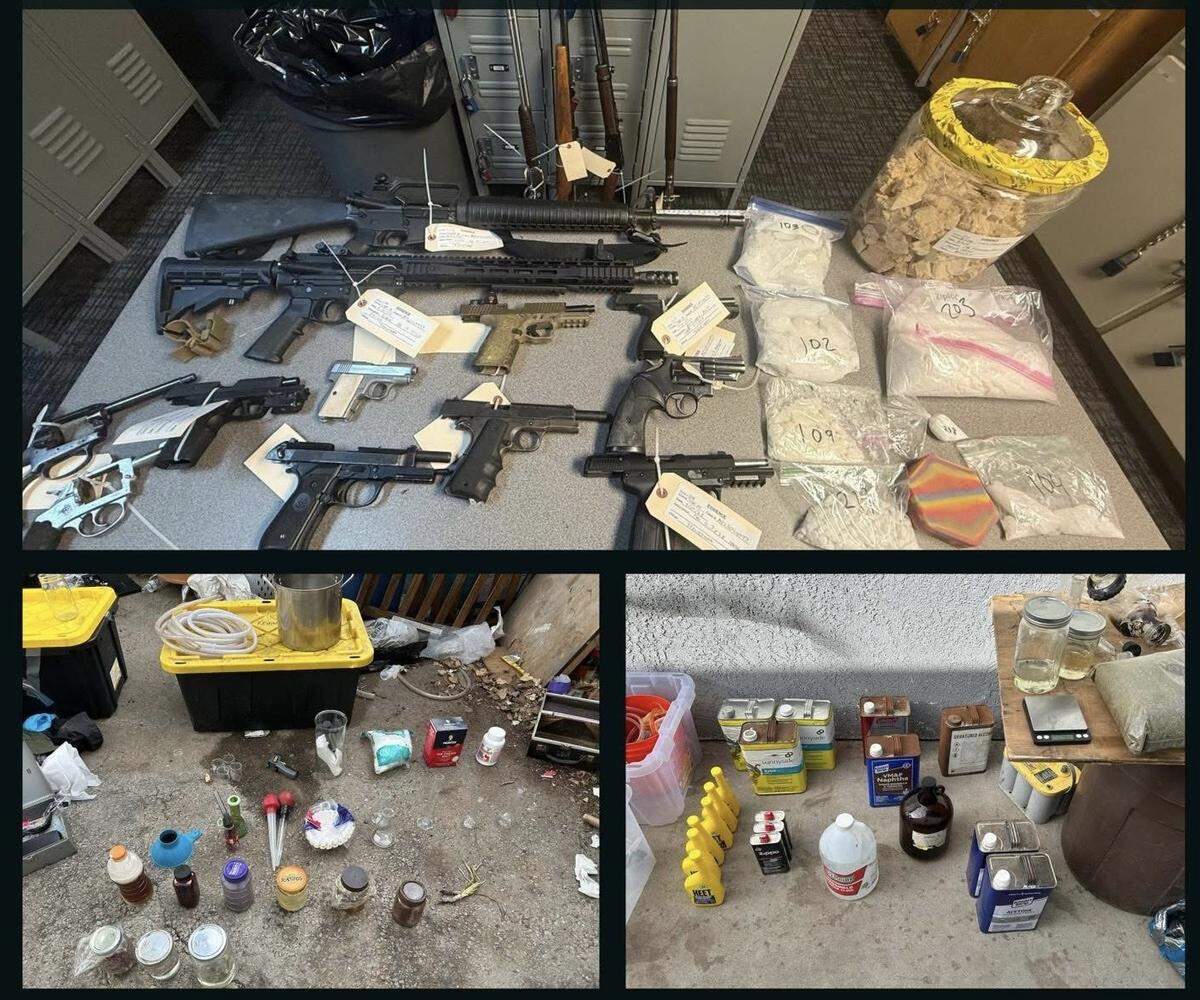 Seized firearms, narcotics and ammunition are displayed after a Modesto Police Department raid Tuesday that uncovered meth and DMT labs inside a Modesto home.