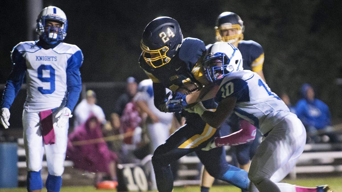 Big Valley’s Caleb Van Donselaar scores a touchdown during Friday night’s game with Brookside Christian at Big Valley Christian High School in Modesto, Calif., on Friday, Oct. 20, 2017. Big Valley won the game 42-20.