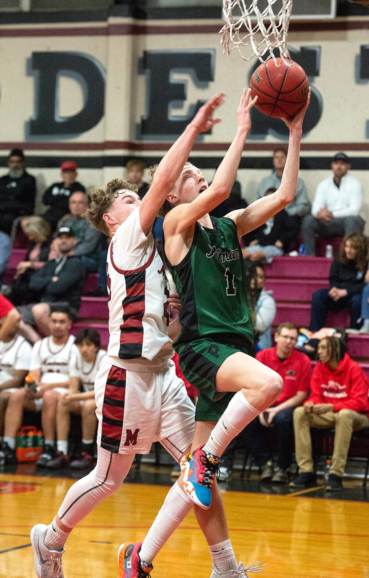 Pitman’s Avery Sanchez scores past Modesto’s Andrew Poulsen during a Central California League game at Modesto High School in Modesto, Calif., Friday, Jan. 13, 2023.