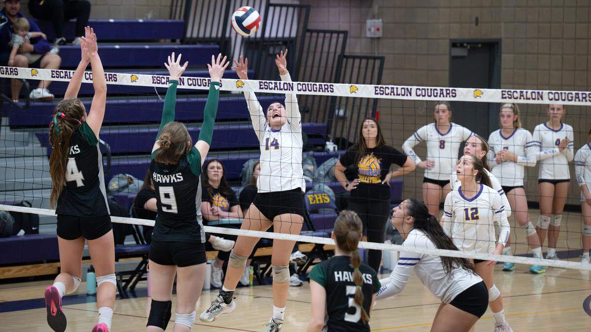 Escalon’s Skyler Owings battles at the net  with Liberty Ranch defenders during the Sac-Joaquin Section Division IV playoff match in Escalon on  Tuesday, Oct. 28, 2025. Escalon won the first-round match 3-0.