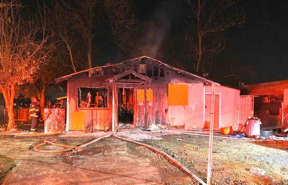 Flames gutted a house Monday night Dec. 30, 2019, near the intersection of Empire Avenue and Bonnie Brae Avenue in Modesto, California.