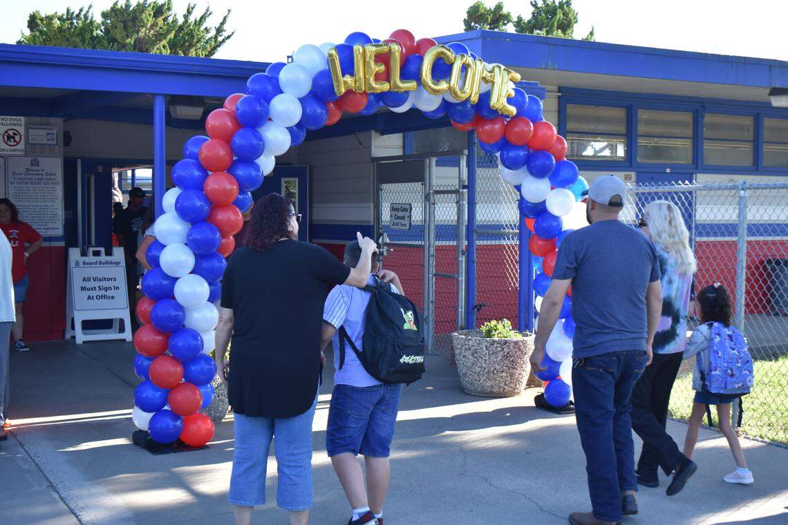 Families drop off their students for the first day of the academic year at Beard Elementary School on Bowen Avenue in Modesto on Monday, Aug. 7, 2023.