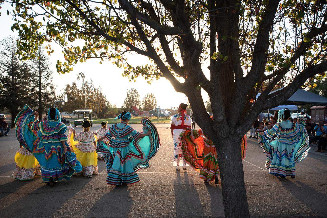 Members of the Ballet Folklórico Falcones perform during the Grayson/Westley/Vernalis Night Out 2022 celebration at the United Community Center in Grayson, Calif., Wednesday, Oct. 12, 2022.