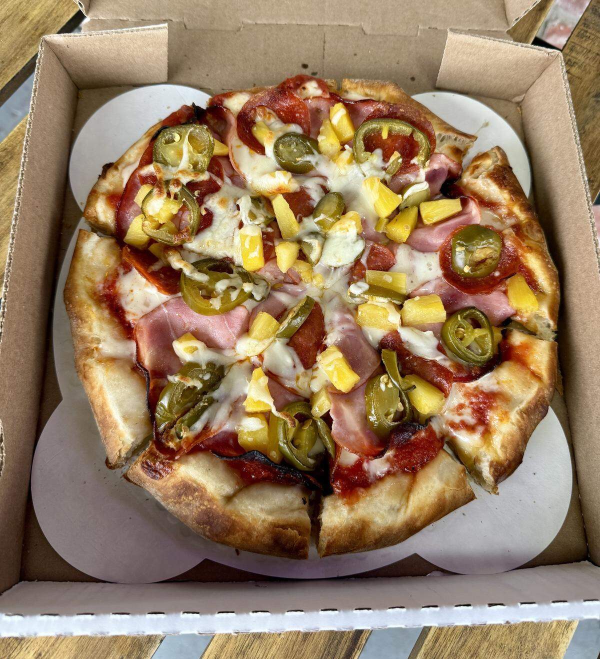 The Italian Hawaiian spice is one of the most-ordered pizzas from Luigi’s Pizza in Modesto, Calif.