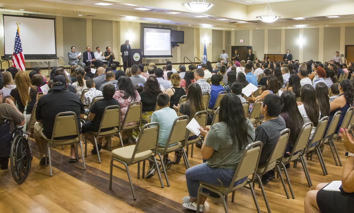 A large group people because US Citizens during a  Naturalization Ceremony at the Ceres Community Center Monday July 31, 2018.