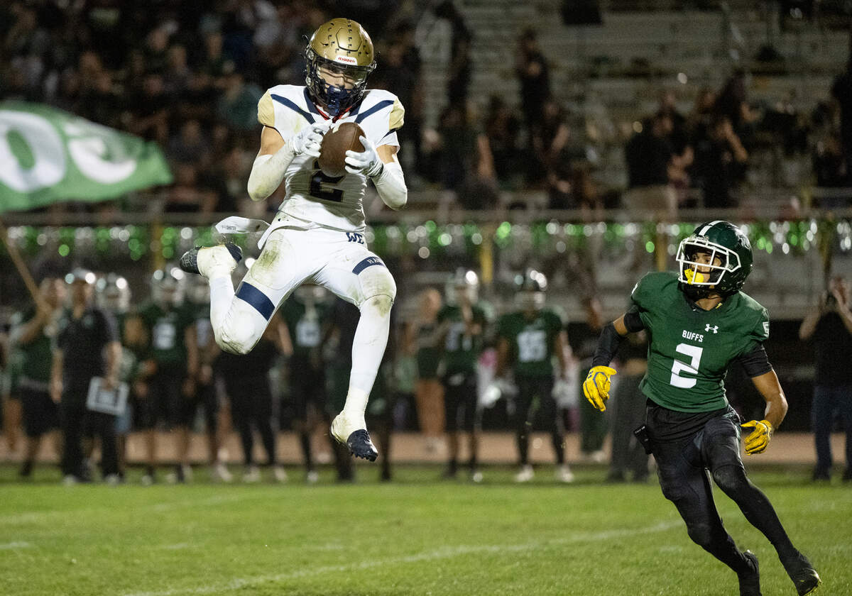 Central Catholic’s Chase Perino makes a reception during the Valley Oak League game with Manteca at Lathrop High School in Lathrop, Calif., Friday, Sept. 27, 2024.