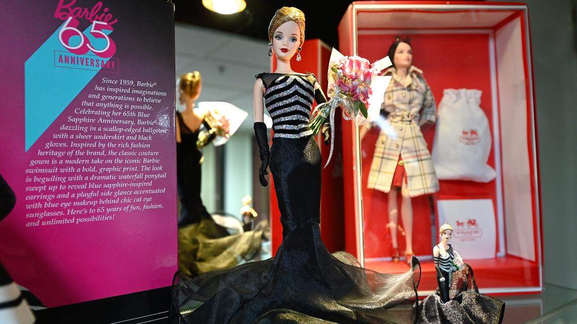 Display cases feature Barbie dolls through the decades at the Be Anything Museum in Modesto, Calif., Thursday, Aug. 22, 2024.