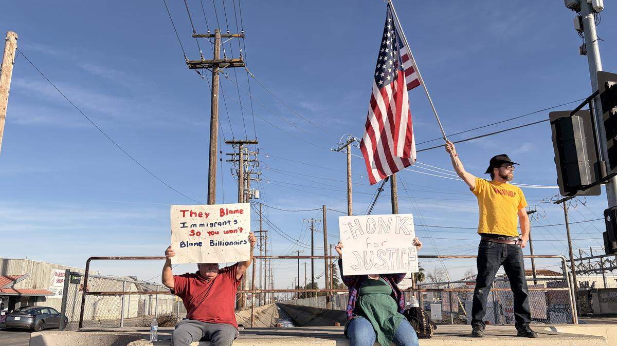 Protesters gathered at the anti-ICE rally at the intersection of Hatch and Crows Landing roads in south Modesto on Saturday, Jan. 10, 2026.