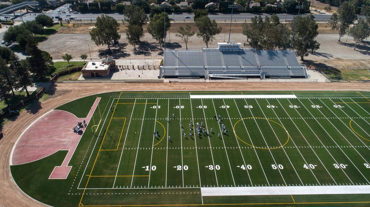 The California Interscholastic Federation (CIF) voted unanimously in early February to make girls’ flag football an official high school sport statewide. Now things are coming together in the Sac-Joaquin Section. Members of the varsity football team practice at Johansen High School in Modesto, Calif., on Thursday, September 1, 2022.