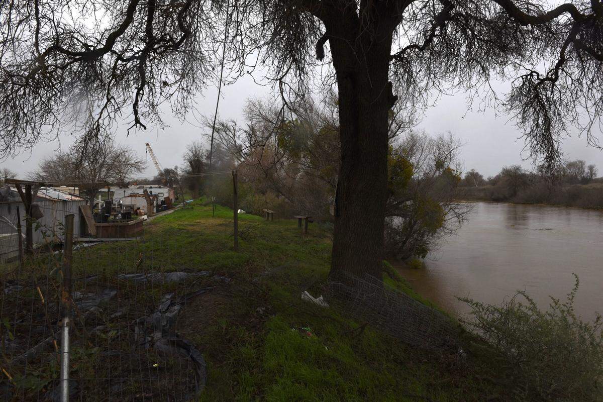 The Catfish Camp mobile home park along the San Joaquin River at Crows Landing Road is pictured Wednesday, Jan. 11, 2023. Residents are under an evacuation order.