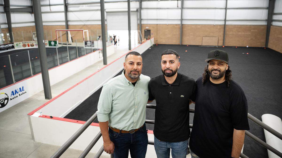 Owners, from the left, Baltej Dosanjh, Gurtej Dosanjh and Ginn Sanghera at the Modesto Sports Center in Modesto, Wednesday, June 4, 2025. A turf field will allow for soccer and futsal, a second building in the center will have courts for volleyball and basketball.