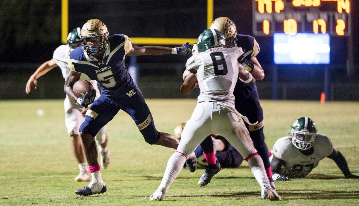 Central Catholic’s Carter Meeks finds an opening on a run during the Valley Oak League game with Manteca at Central Catholic High School in Modesto, Calif., Friday, Oct. 20, 2023.