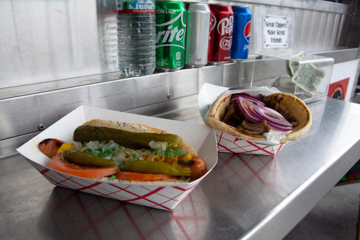 A Chicago-style hot dog and a gyro sandwich are two of the menu offerings at Sark’s City Grill in Modesto, Calif.