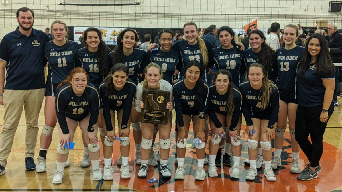 Central Catholic girls volleyball players and coaches take a picture after falling to Los Gatos in straight sets in the CIF State NorCal Regional Division II Final on Tuesday, Nov. 19, 2019.