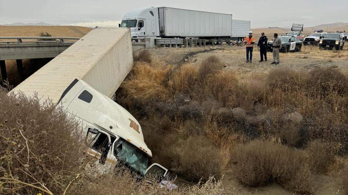 Personnel from the California Highway Patrol Modesto office and Caltrans District 10 work the scene of a major-injury traffic collision on southbound Interstate 5 south of Stuhr Road in the Newman area Wednesday afternoon, Nov. 15, 2023.