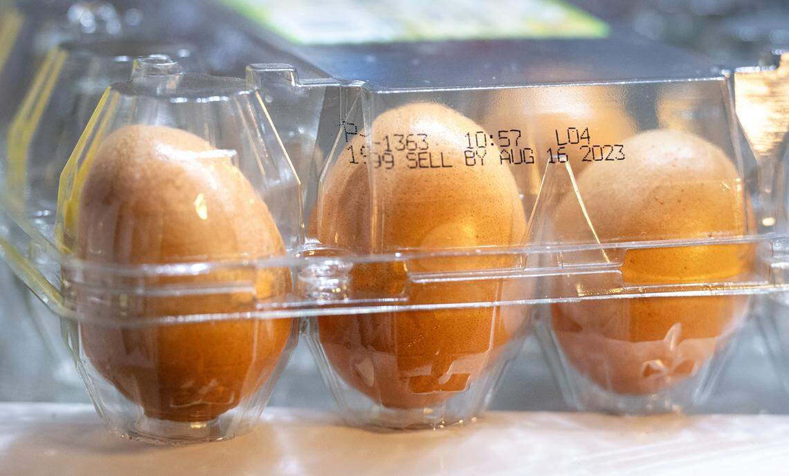 A “sell b”y food label on a carton of eggs. 