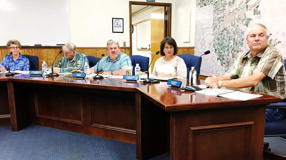Oakdale Irrigation District board members Gail Altieri, Herman Doornenbal, Tom Orvis, Linda Santos and Brad DeBoer in the OID board room in Oakdale on Tuesday, Sept. 18, 2018. 