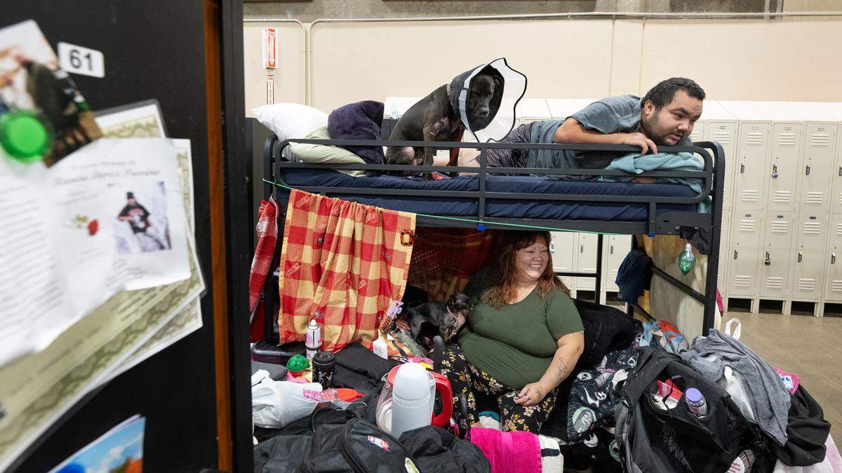 Genie Garcia and her son Juan are currently staying at the Stanislaus County’s 182-bed low-barrier shelter, with their dogs, having been homeless since 2016. Photographed at the Salvation Army Berberian Center in Modesto, Calif., Wednesday, Nov. 22, 2023.
