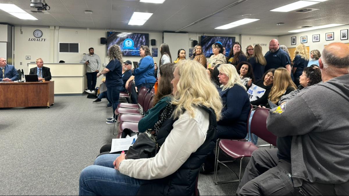 Teachers line up to express their thoughts on Modesto City Schools’ recommended realignment of sunsetting COVID funds on Tuesday, Nov 12. Approximately 93 positions are slated to be laid off, if approved by the board.