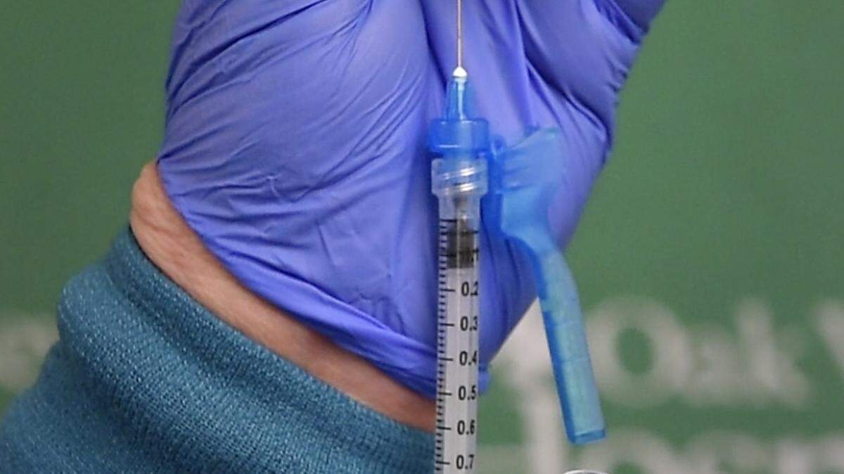 Nurse Regina Singh prepares the COVID-19 vaccine at Oak Valley Hospital in Oakdale, Calif., Friday, Dec. 18, 2020.