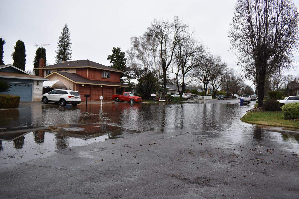 After heavy rain in the early hours, Dragoo Park Drive in north Modesto had flooding Monday morning, Jan. 16, 2023, that extended well into driveways.