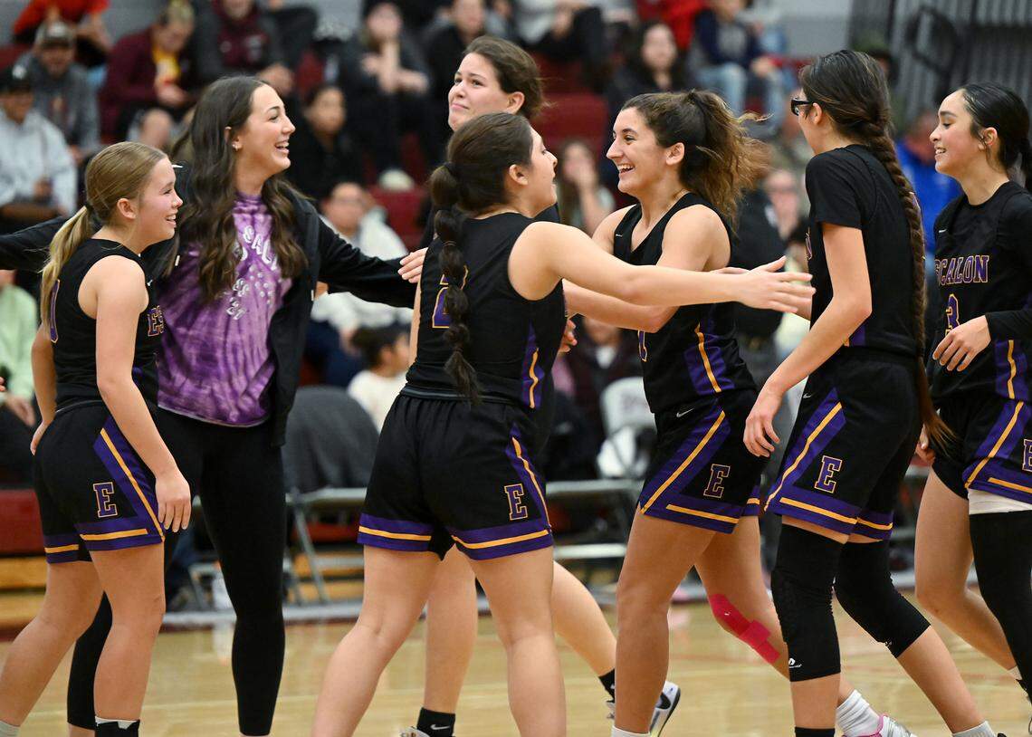 Escalon team members celebrate their 52-51 victory over Riverbank in the Trans Valley League game at Riverbank High School in Riverbank, Calif.,Thursday, Jan. 4, 2024.