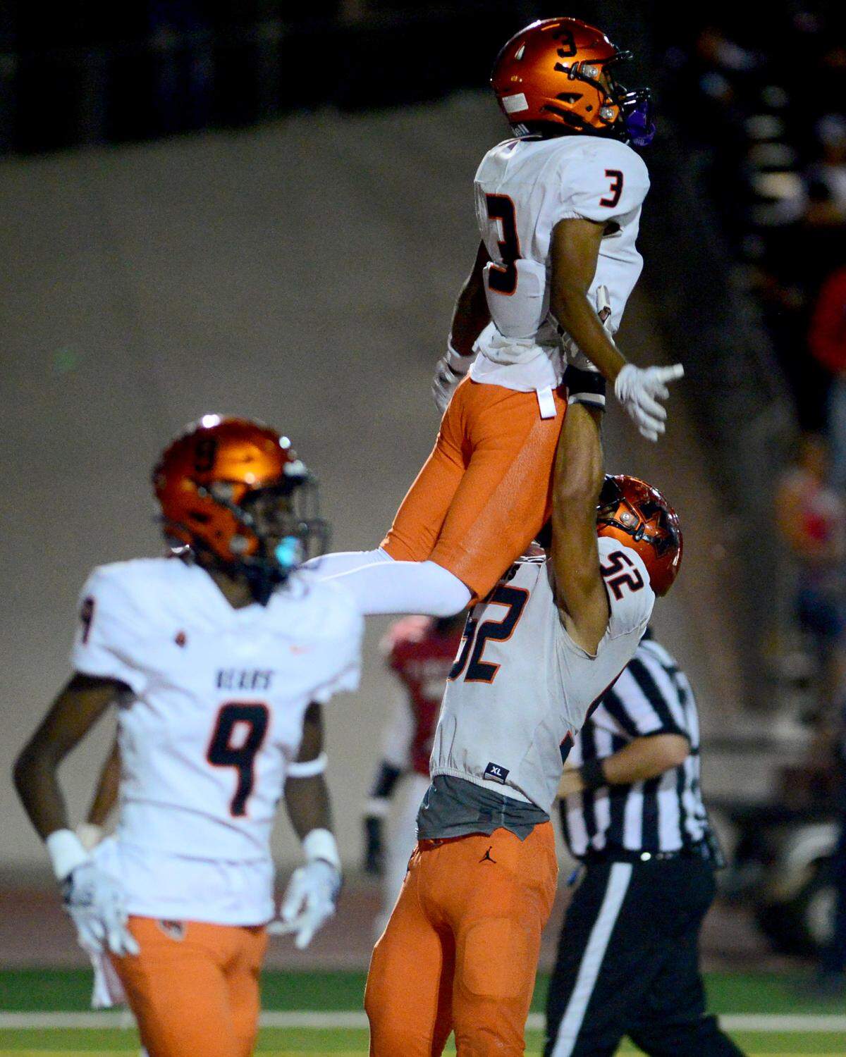Merced receiver Jordan Dupree (3) celebrates with teammate Jalonn Booth (53) after scoring a touchdown during a game between Patterson and Merced at Patterson High School in Patterson California on September 29, 2023.