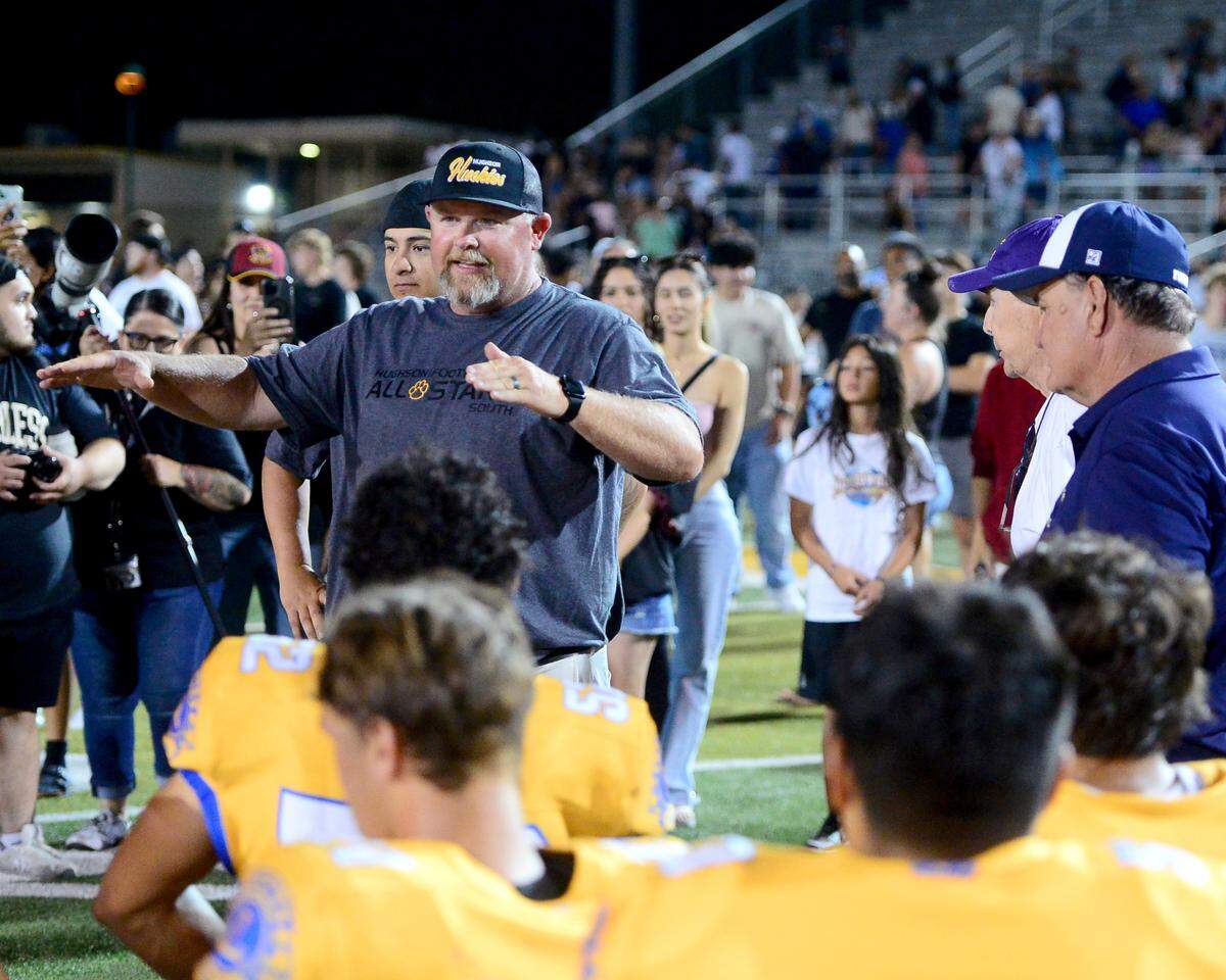 South Team co-head coach Shaun King talks to his team after winning the 2024 Lions All-Star High School Football game at Tracy High School in Tracy, Calif. on June 22, 2024.