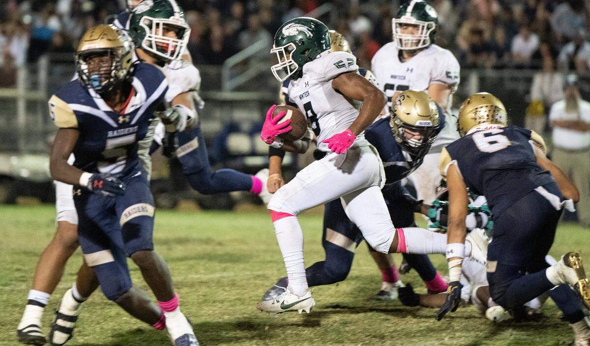 Manteca’s Jhadis Luckey runs the ball during the Valley Oak League game with Central Catholic at Central Catholic High School in Modesto, Calif., Friday, Oct. 20, 2023.