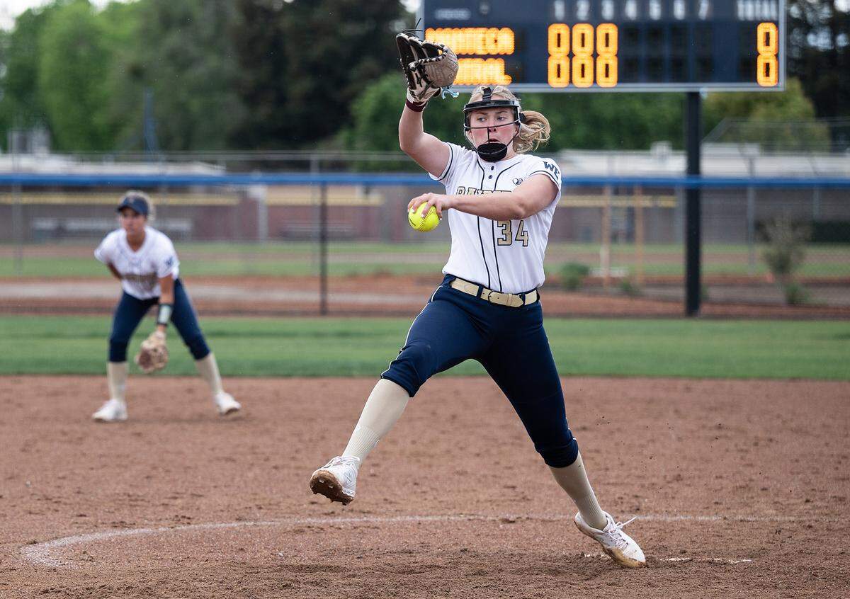 Central Catholic pitcher Randi Roelling delivers a pitch during the Valley Oak League game with Manteca at Central Catholic High School in Modesto, Calif., on Monday, March 28, 2022. Central Catholic won the game 1-0.