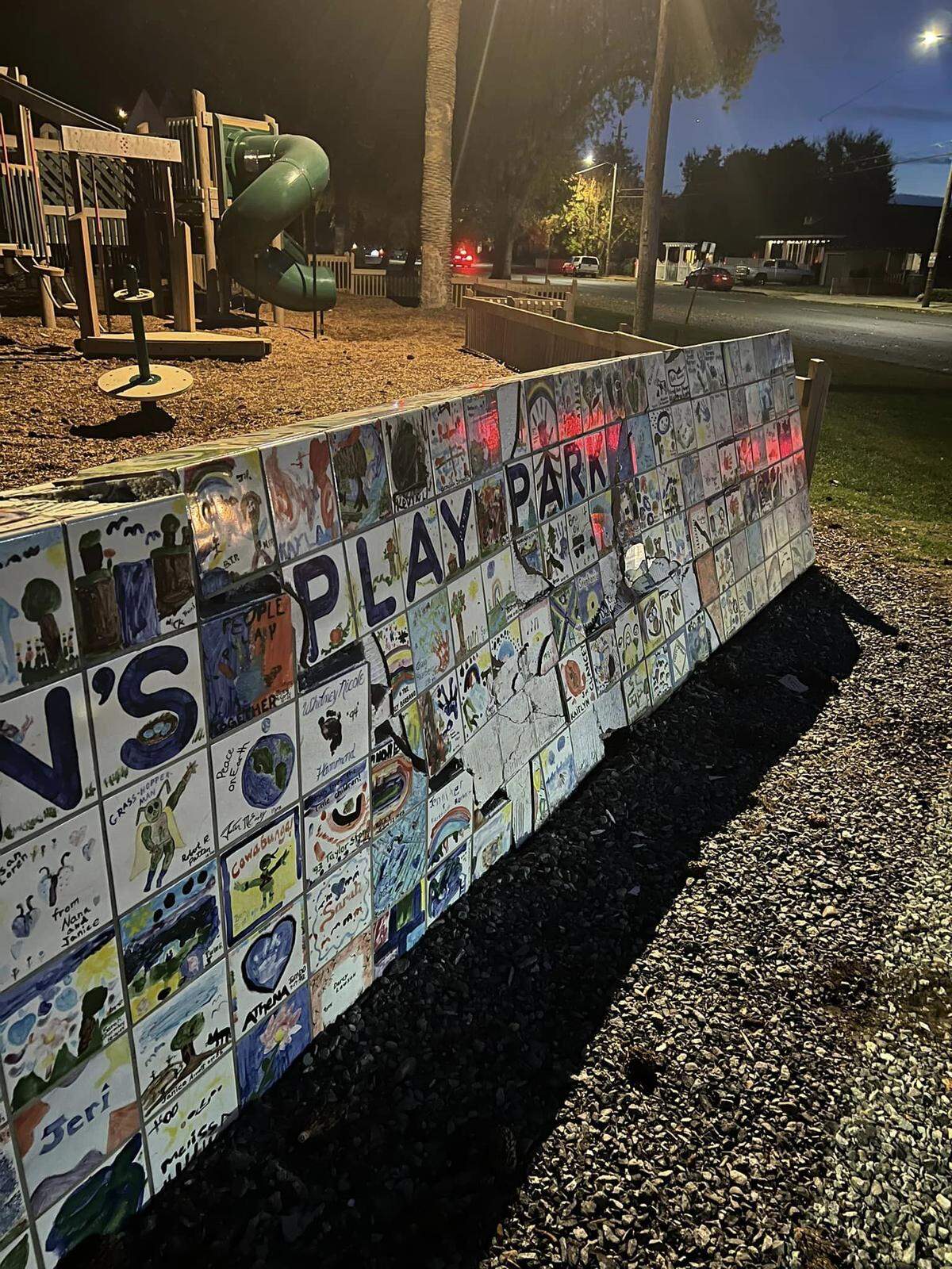 The aftermath of a collision that happened during a police pursuit near Dorada Park in Oakdale on Sunday, Nov. 24, 2024. A white pickup truck damaged a tiled wall with school children’s art. The wall of was of historic significance, according to the City of Oakdale.