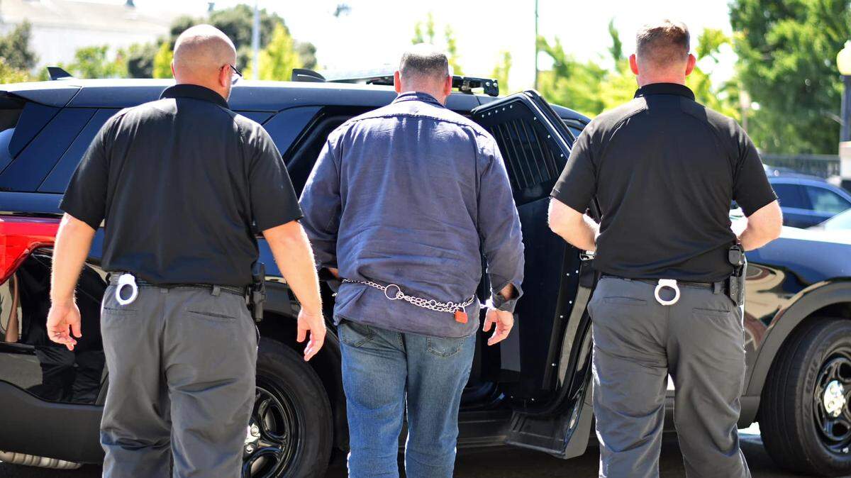 Modesto police detectives arrest Justin Guice on Tuesday afternoon, Aug. 29, 2023, on suspicion of homicide in a nearly 20-yeaer-old case.