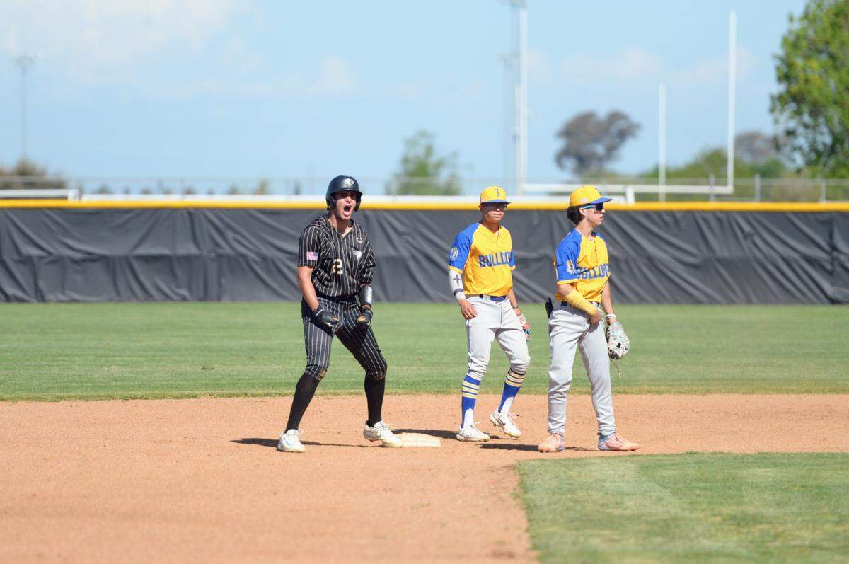 Enochs’ Nicholas Poulus celebrates a double during a CCAL matchup with Turlock at Enochs High School in Modesto, Calif. on Friday, April 19, 2024.