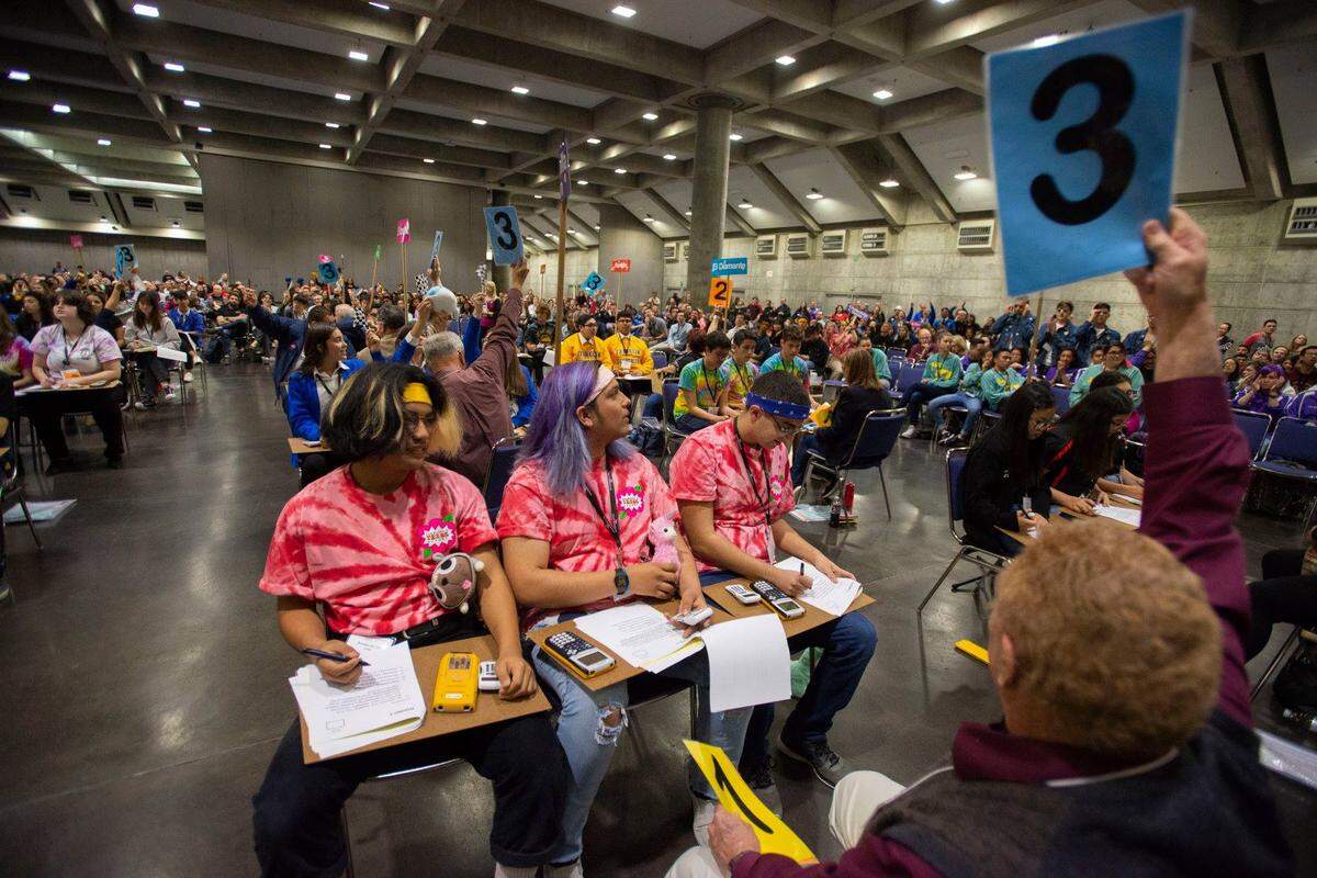 Many dressed to fit the 1960s theme, students from throughout the state compete in the Super Quiz of the California Academic Decathlon, held in Sacramento on March 22-24.